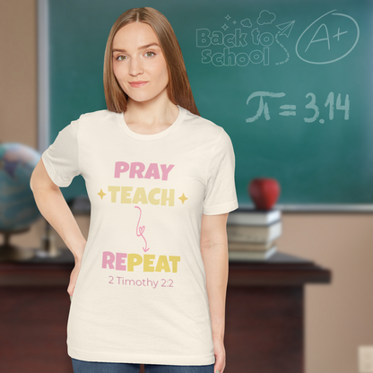 Pray Teach Repeat Coquette Bow (with 2 Timothy 2:2 Bible Verse) Christian Tee — Back-to-School Pastel Stars