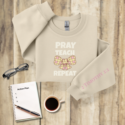 Pray Teach Repeat Croquette Plaid Bow w/Bible Sleeve Verse (2 Timothy 2:2)• Christian Teacher Sweatshirt• Gildan 18000 • Back to School