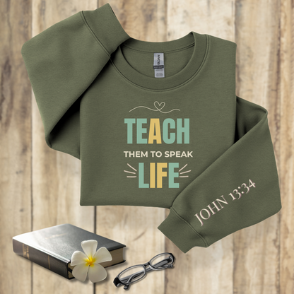 Teach Them to Speak Life Pastel w/Bible Sleeve Verse John 13:34 • Christian Teacher Sweatshirt — Gildan 18000 • Back to School