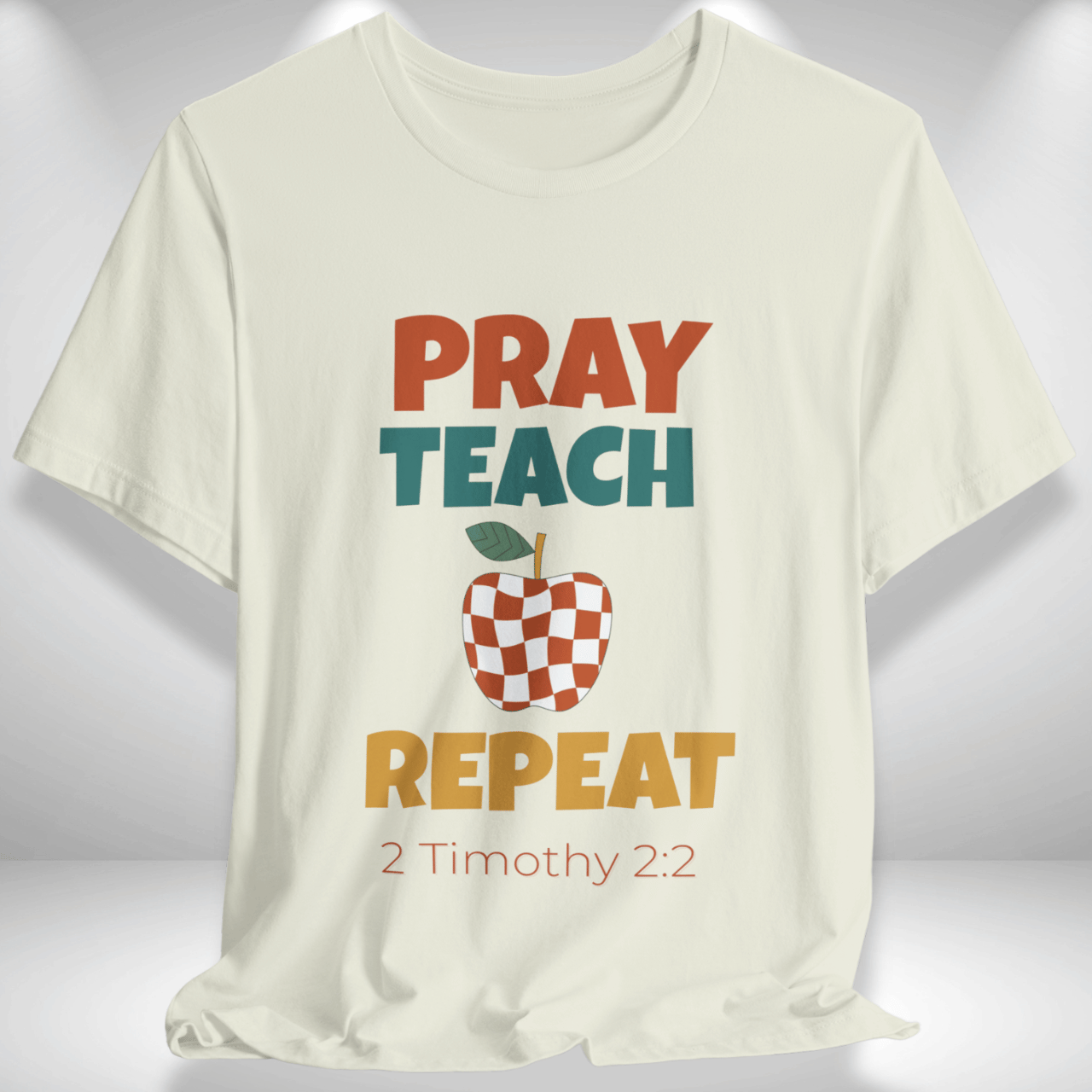 Pray Teach Repeat Apple ( with 2 Timothy 2:2 Bible Verse) Christian Tee — Back-to-School Retro Checkered Apple