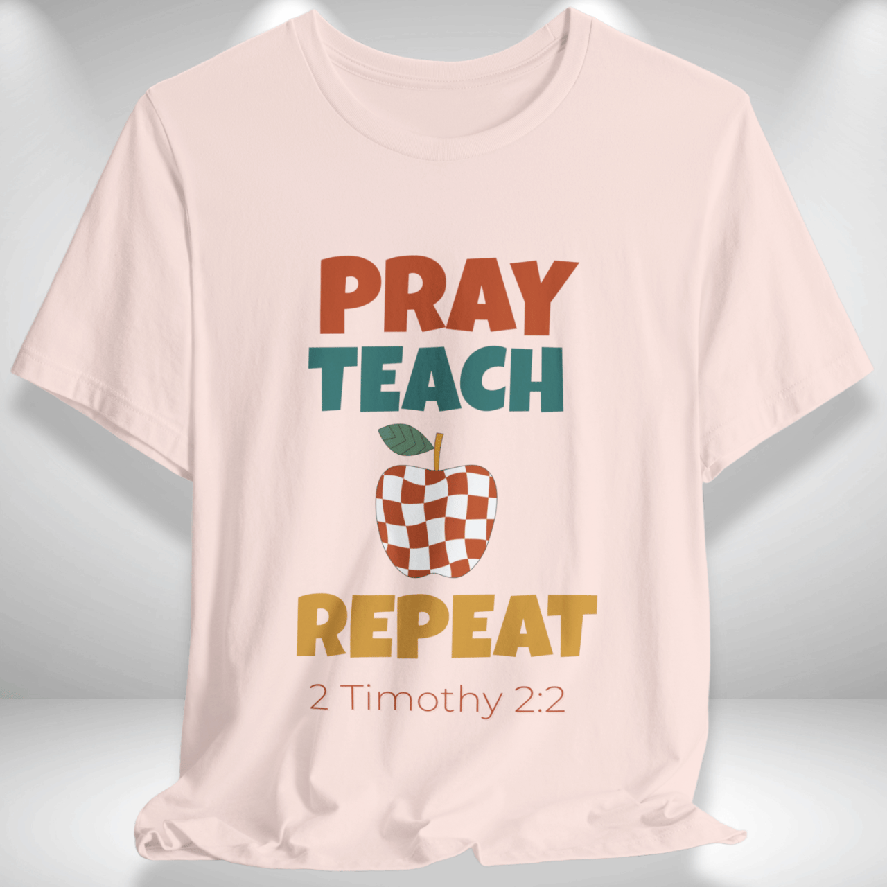 Pray Teach Repeat Apple ( with 2 Timothy 2:2 Bible Verse) Christian Tee — Back-to-School Retro Checkered Apple